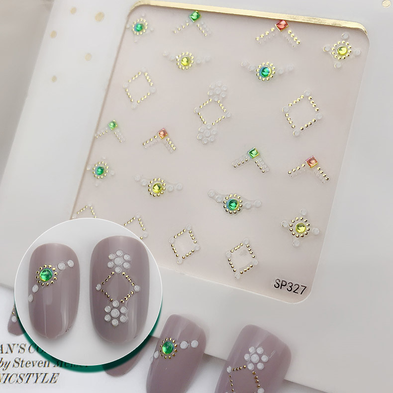 Raised nail stickers with jewel-like motifs and sample nails